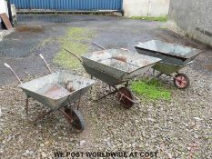 Three vintage wheelbarrows,