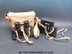 A cased set of 1943 Taylor - Hobson Bino Prism No 2 Mk III binoculars and another similar loose set