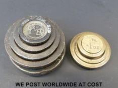 A run of four bronze weights,