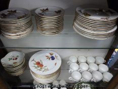 Over 50 pieces of Royal Worcester 'Evesham Gold' dinner and tea ware.