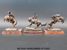 Three bronze Franklin Mint cowboy figures on plinths, The Outlaw,