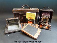 A cased Bausch and Lomb Unicum folding camera