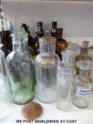 A collection of pharmaceutical and medicine bottles to including some matching 