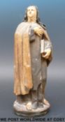 A 19thC / 20thC pottery figure of an Abbess (26cm tall)