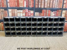 A vintage set of shopfitting / haberdashery / engineer's wooden cubby holes with brass ticket