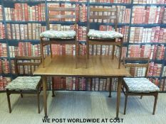 A retro Meredew table and four chairs (table H75 x W118 x D89cm)