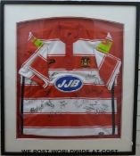 A framed Wigan Rugby League signed shirt.
