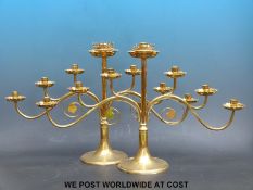 A pair of brass candelabrum