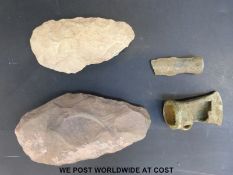 Two stone age axe heads and two bronze age axe/spear heads