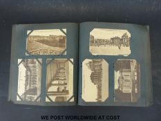 An album of mainly continental topographical postcards including WWI interest, Versailles etc.