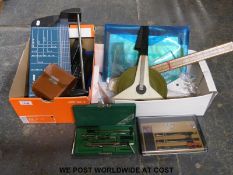 A quantity of drawing equipment, surveyor's tape, staplers,