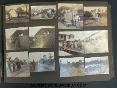A photograph album circa Edwardian or George V era with photos of African tribes,