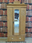 A carved satin walnut wardrobe with single drawer to base (H196 x W97 x D40cm)