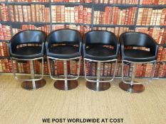 Four bar stool tub chairs and one other.