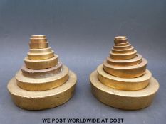 Two stacks of Avery weights (4Ibs downwards)