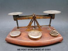 A set of TJ & J Smith Victorian postage scales with weights to base