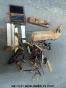 A quantity of woodworking tools including a small unnamed plane, slide rules etc,