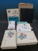 A large box of loose stamps,