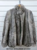 Two vintage fur coats, one marked inside Blackglama,