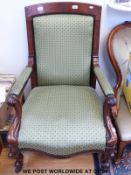A late Victorian mahogany upholstered armchair