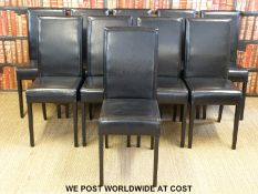 A contemporary dining table (107 x 240cm) and ten matching chairs