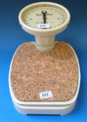 A set of Waymaster person weighing scales with circular dial.