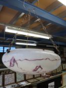 A 1920s-30s glass lamp shade with original chains and bakelite fitting