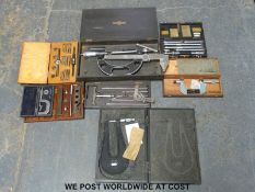 A quantity of micrometers and similar engineering tools to include adjustable,