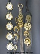 A quantity of martingales with brasses including clover leaf design, crescent with star to centre,