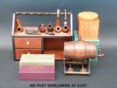 A pipe smoker's stand, tobacco jar, various pipes to include Dunhill 9ct gold mounted example,