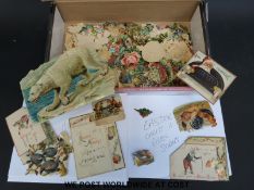 A box of scraps including Victorian/Edwardian cut outs both humorous and serious of animals,