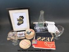 A quantity of Guinness memorabilia to include 1955 gold rimmed Waterloo glasses,