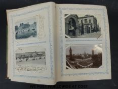 An album of postcards to include Zeppelins, aircraft, WWI, topographical including Clifton,