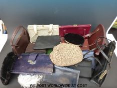 Two boxes of vintage textiles including leather handbags, furs, ties, scarves,