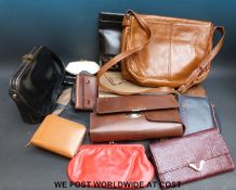 A collection of vintage hand bags and purses,
