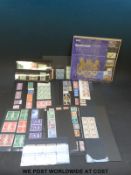 A selection of mint GB and Commonwealth stamps on stock cards including blocks,