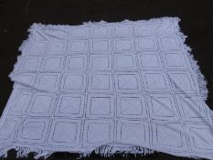 A large 19thC crochet bedspread made for the vendor's grandmother in 1873.