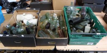 A large collection of glass bottles