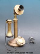 A candle stick vintage telephone