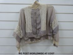 A circa 1900 silk dress with remnants of lace overdress, a peach dress,