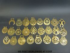 Approximately 25 late 19thC /early 20thC and later mainly cast horse brasses including triple