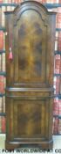 A double height corner cupboard (H190 x W67 x D48cm)