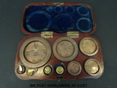 A cased run of Victorian City of London standard weights from 8oz with Degrave & Co and other