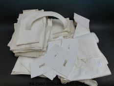 A quantity of possibly nurses' uniforms including starched collars