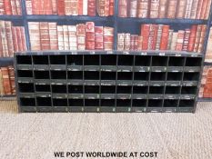 A metal military or similar style cubby hole unit (H44 x W130 x D23cm)