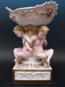 A Capodimonte figural pedestal centrepiece,