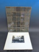 A leaded glass panel made up from photographic slides including country houses, Blackpool tower etc.