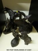 Six resin /bronze figures, blacksmith, whale, otter etc.