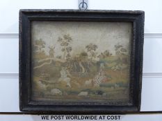An 18th/19thC embroidery of a man playing a musical instrument to a lady in a countryside setting