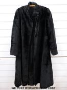 A 1950s two-piece suit tailored for Peter Robinson by Lyndale,